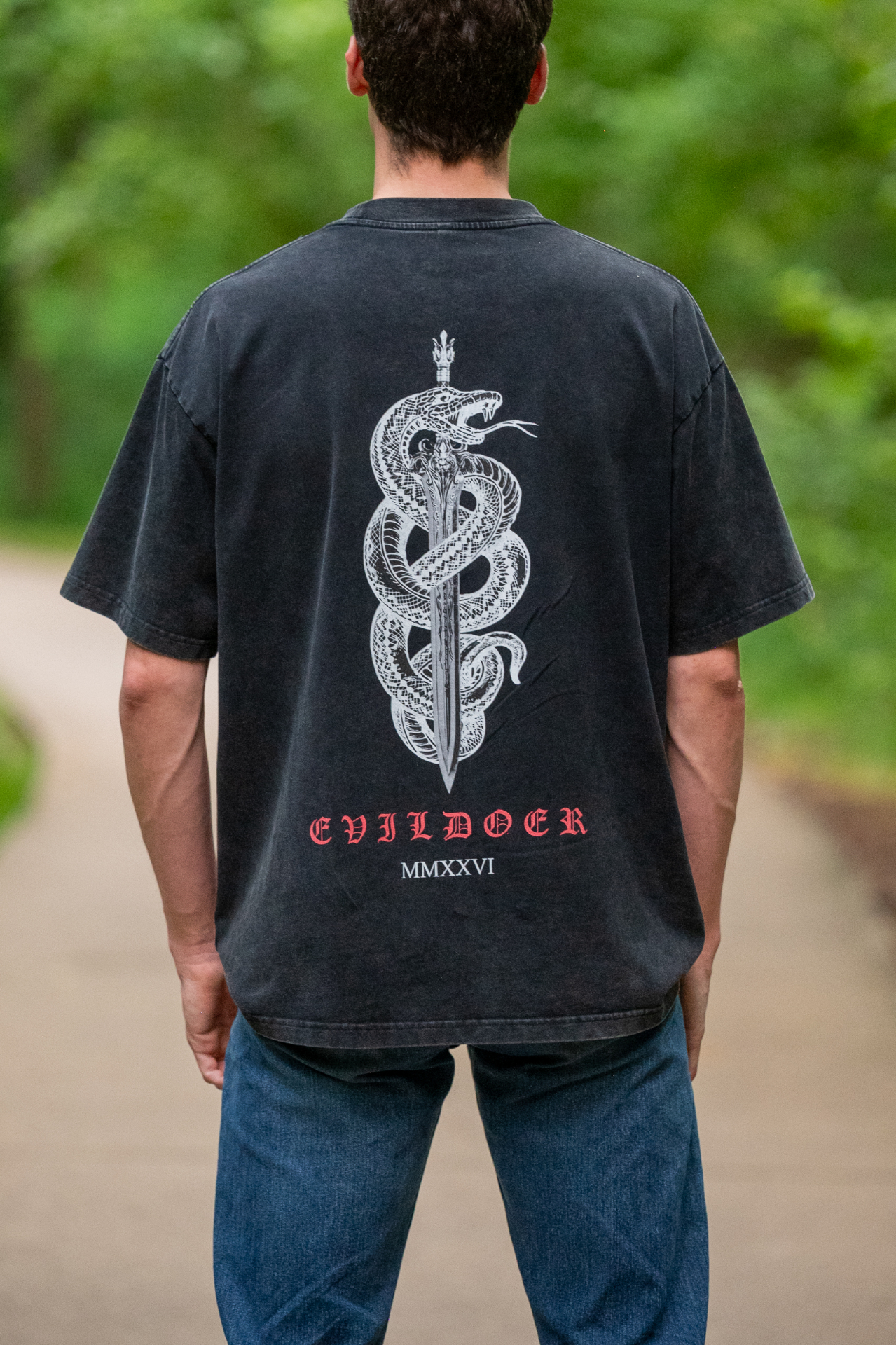 Evildoer MMXXVI snake and sword back print